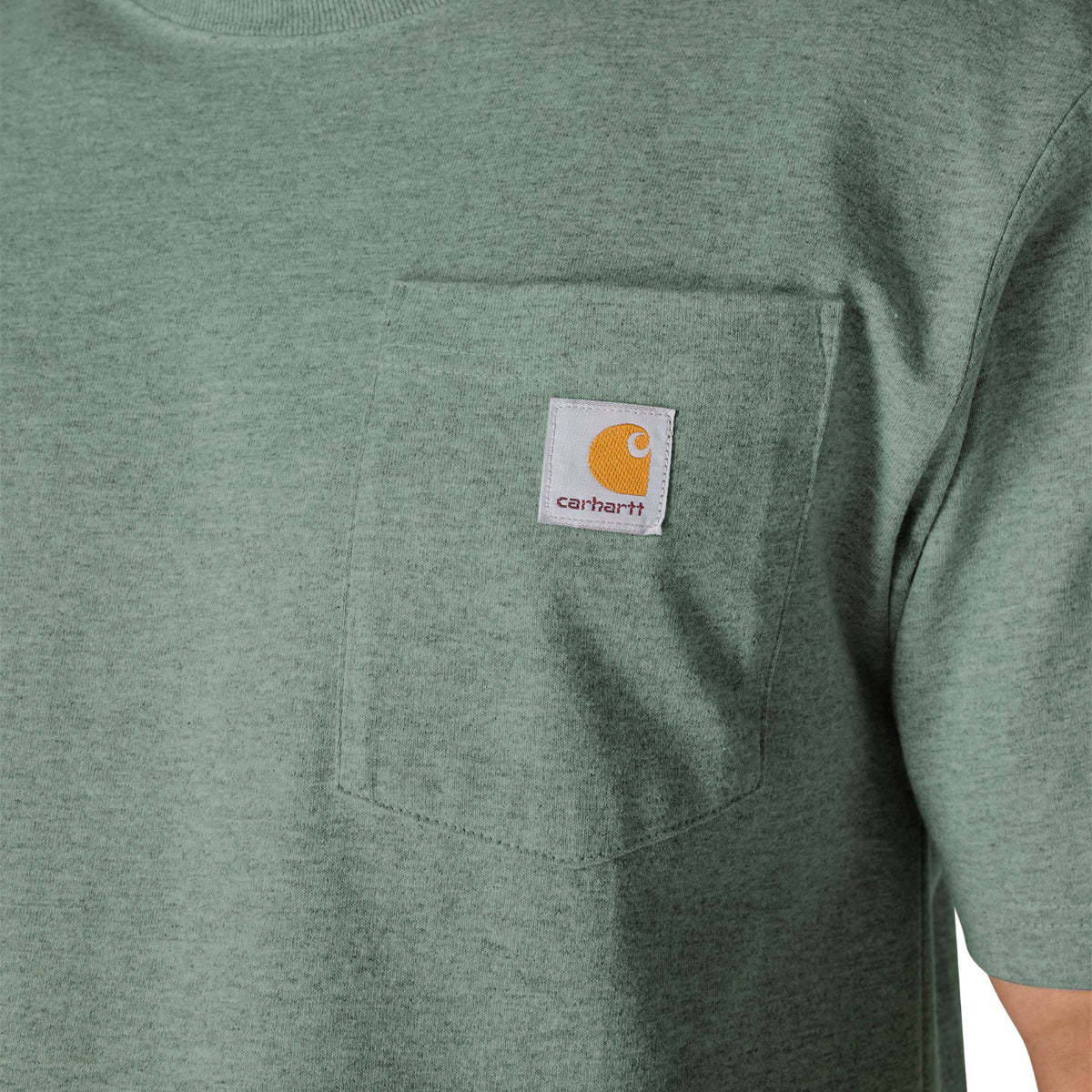 Green t-shirt with Carhartt logo on a pocket