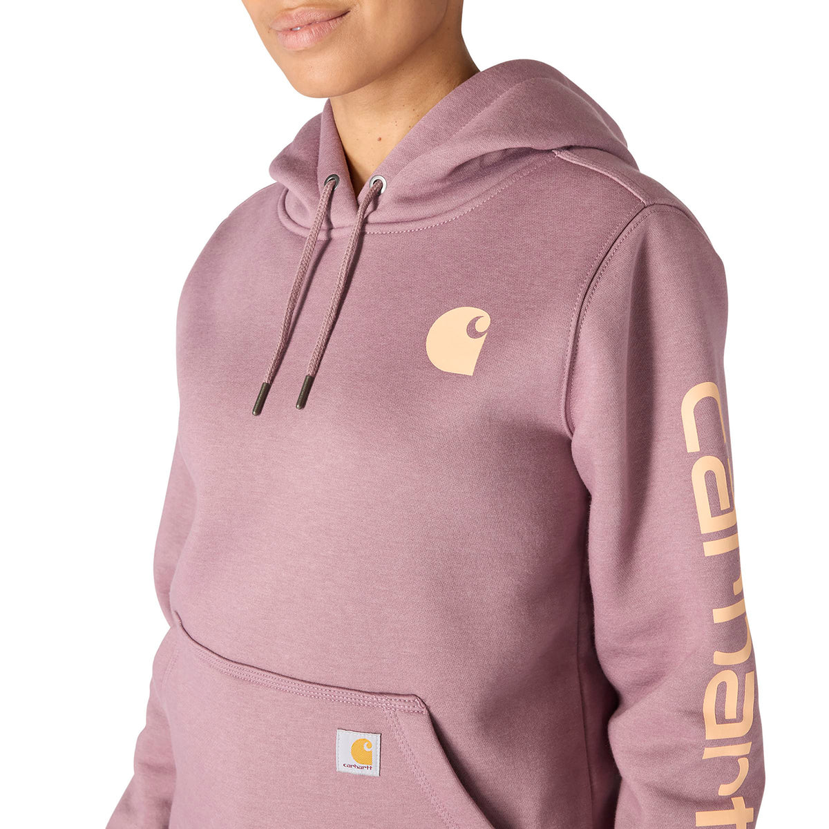 Pink hoodie with Carhartt logo on a white background