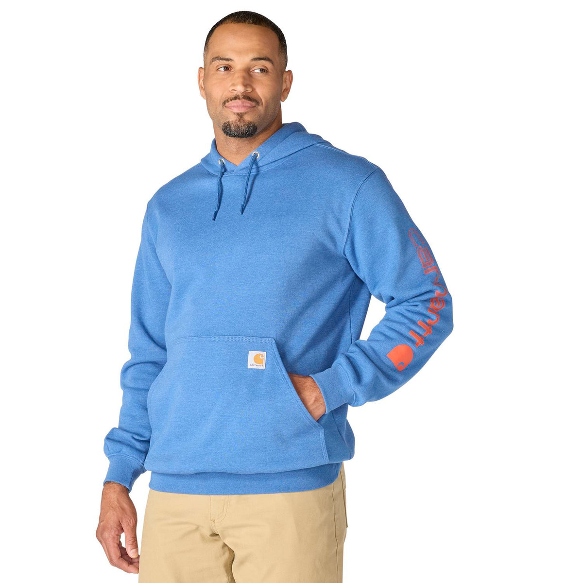 Man wearing a blue hoodie with a visible brand logo on a white background