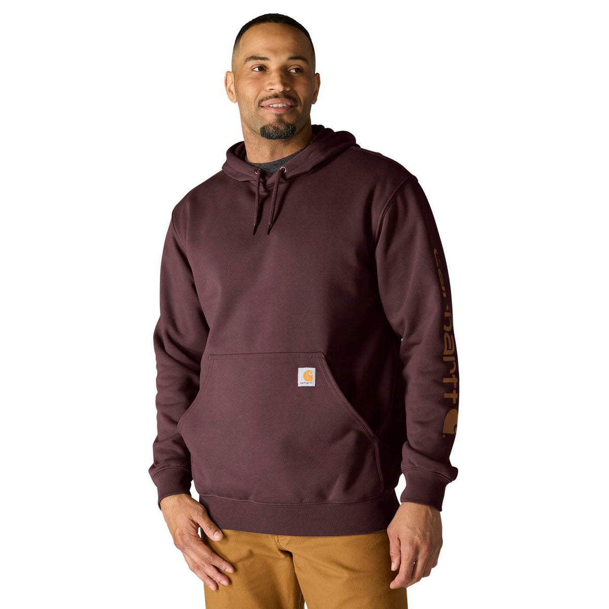 Man wearing a maroon hoodie with a visible brand logo on a white background